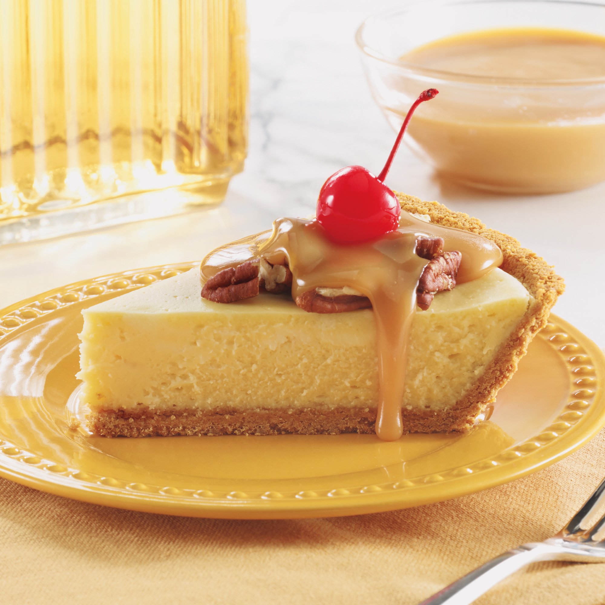 Cheesecake With Toasted Pecan Praline Sauce Recipe from HEB