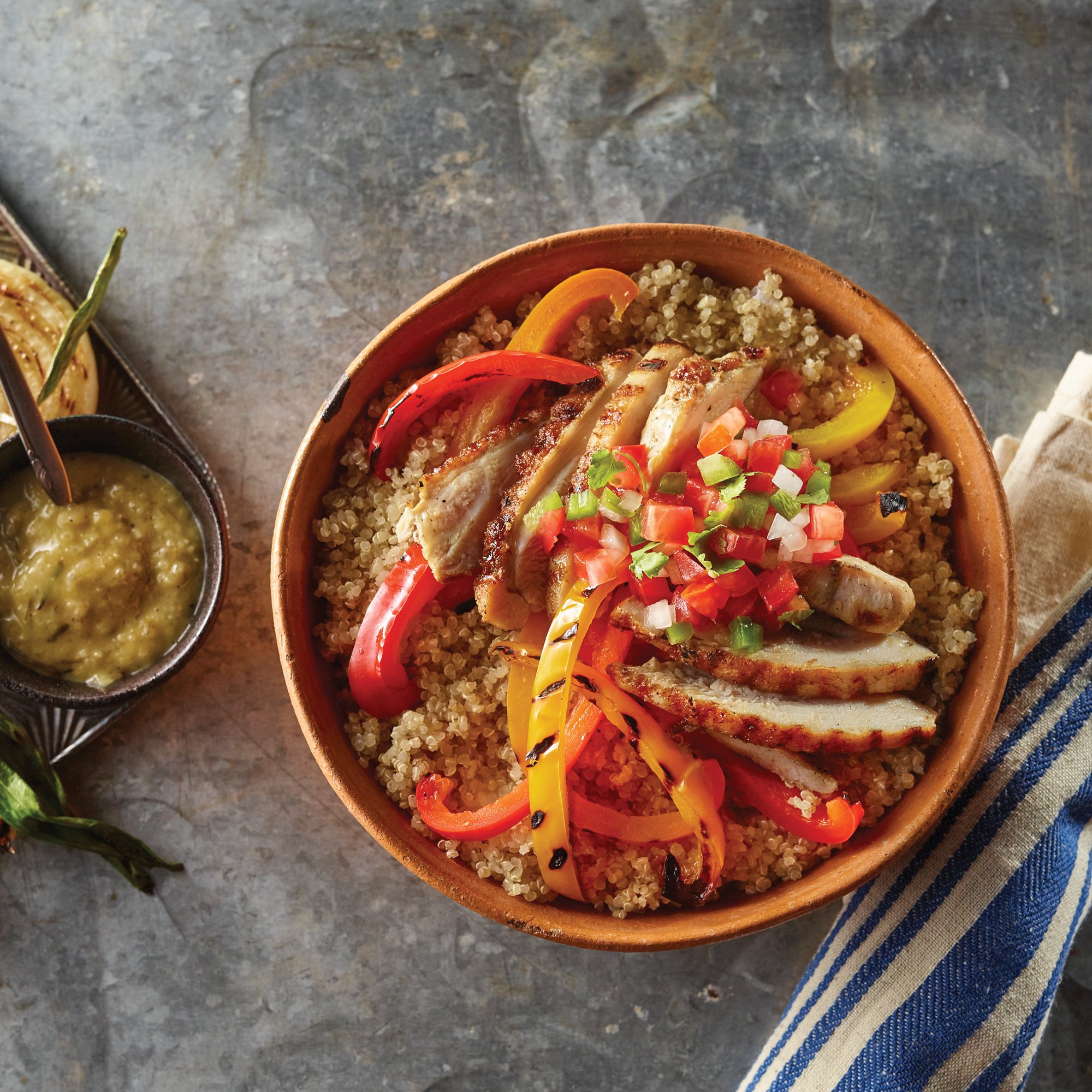 Chicken Fajita Quinoa Bowl with Grilled Onion Vinaigrette Recipe from HEB