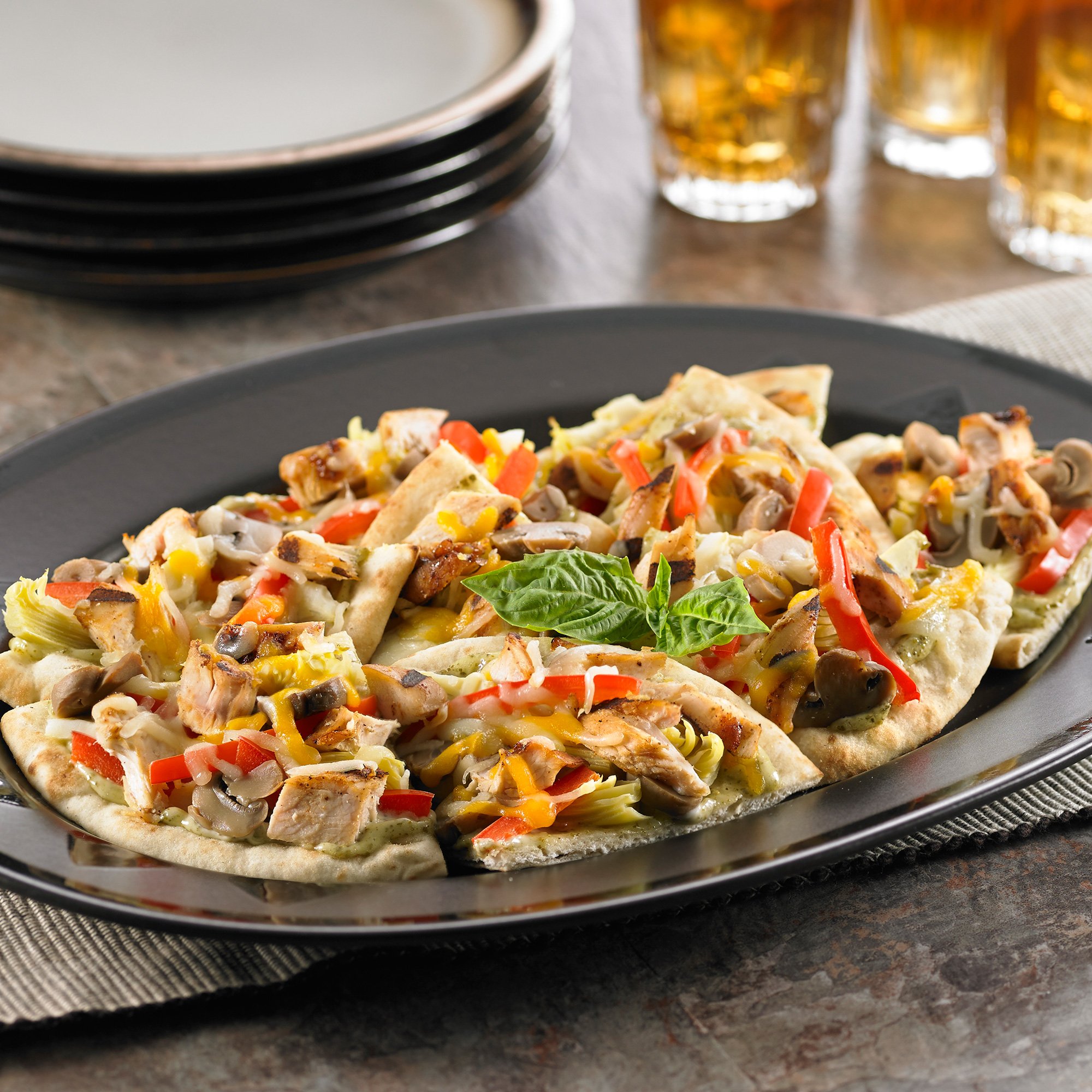 Chicken Pesto Pita Pizzas Recipe from HEB