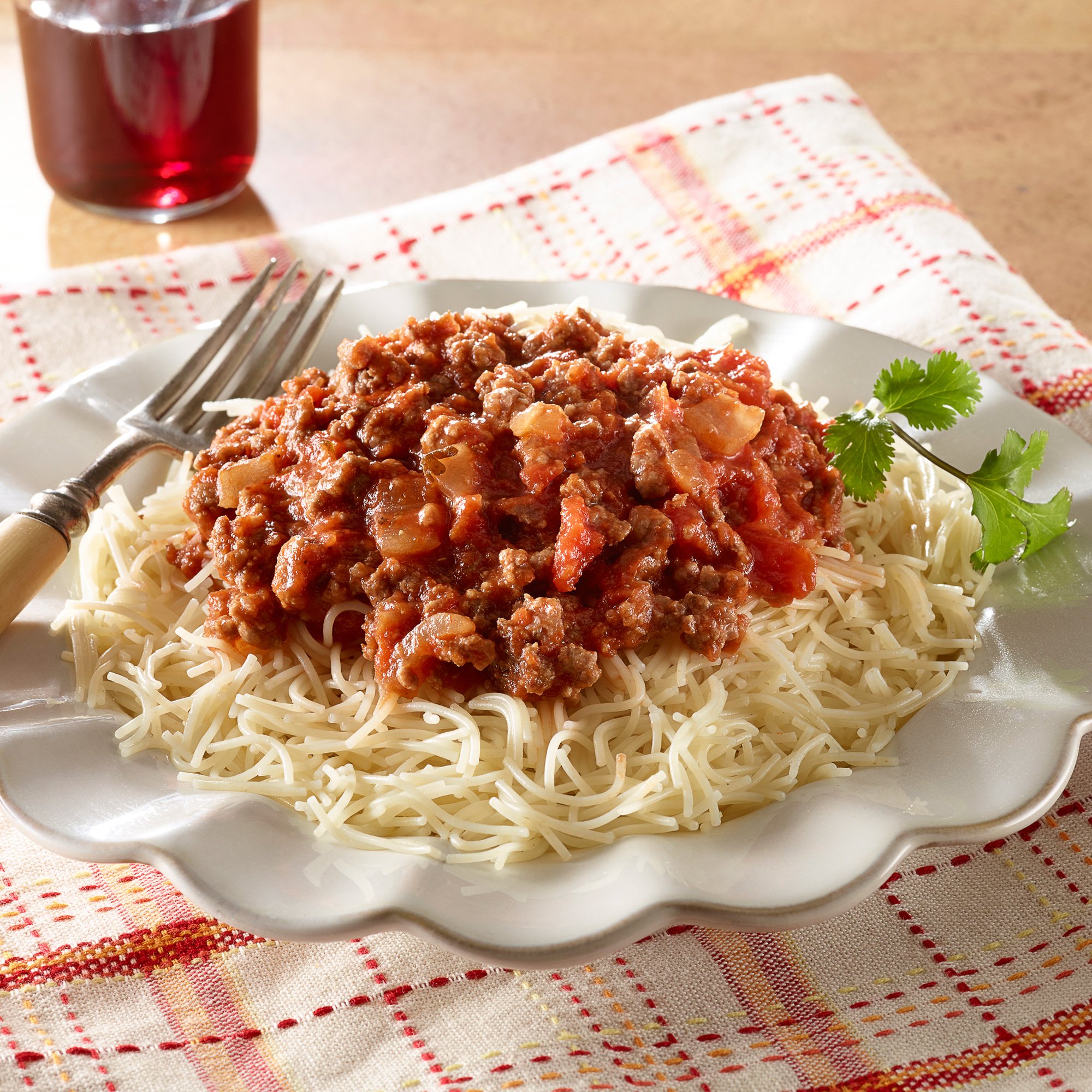 Laredo classic fideo pasta dish with tomato sauce and meat.