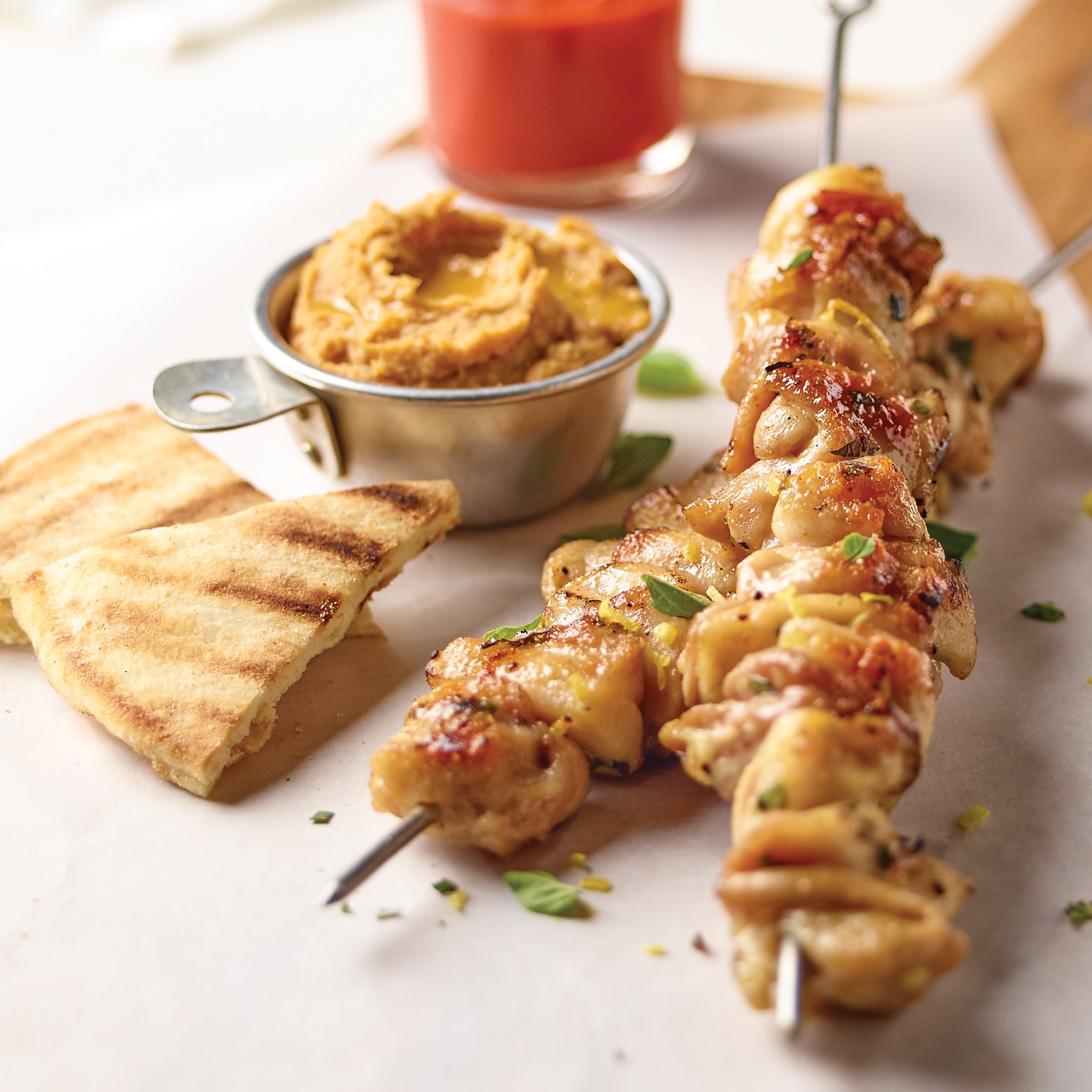 Grilled Chicken Thighs with Morita Chili Hummus Recipe from HEB