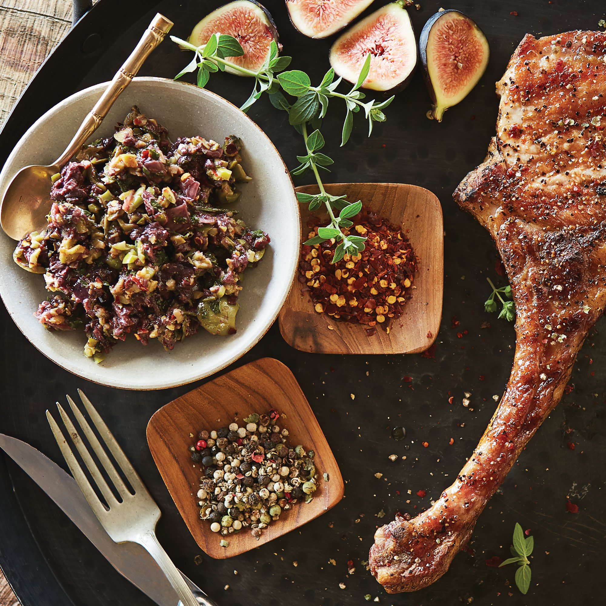 Grilled Pork Tomahawk with Spicy Olive Tapenade Recipe from HEB