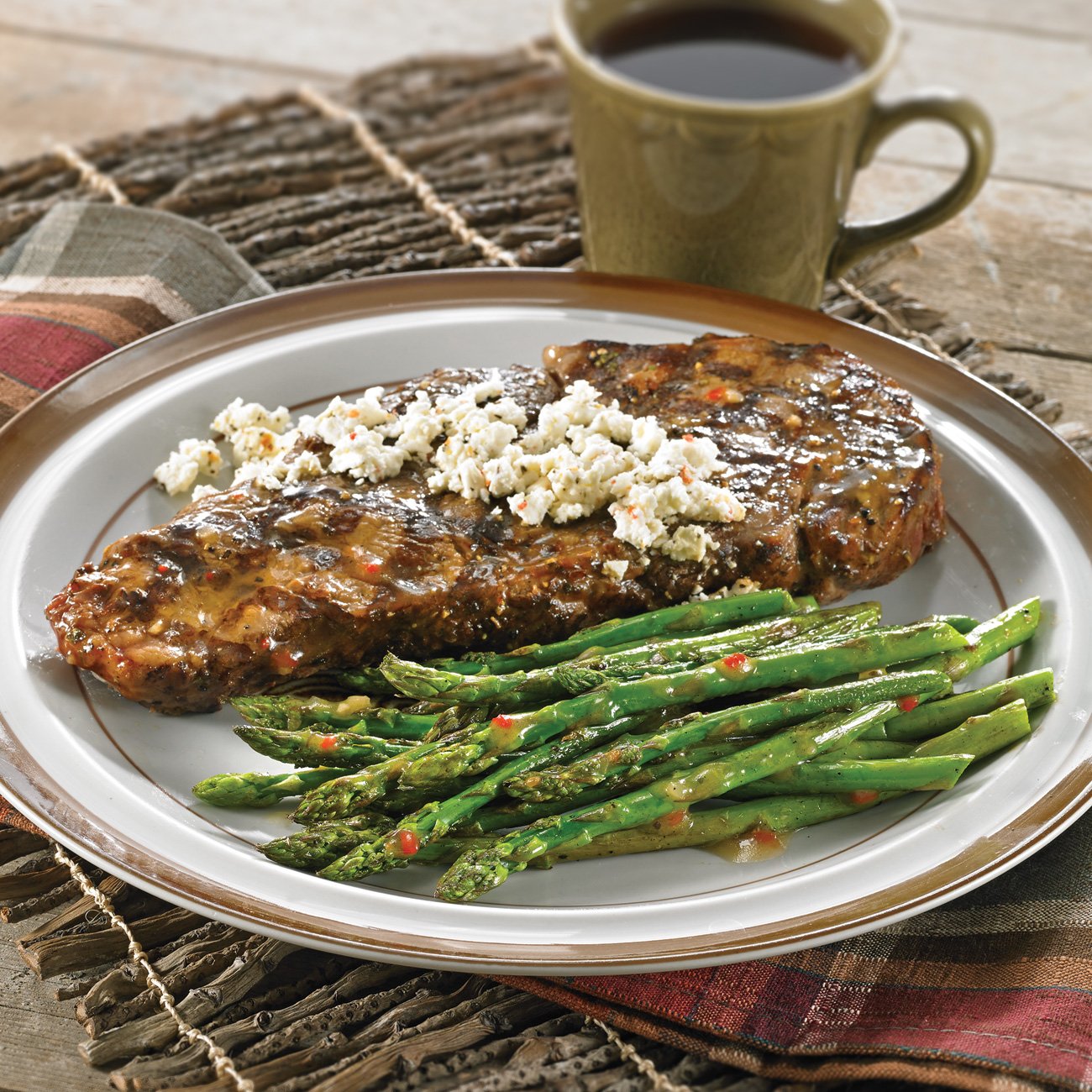 HerbMarinated Beef Steaks With Asparagus Recipe from HEB