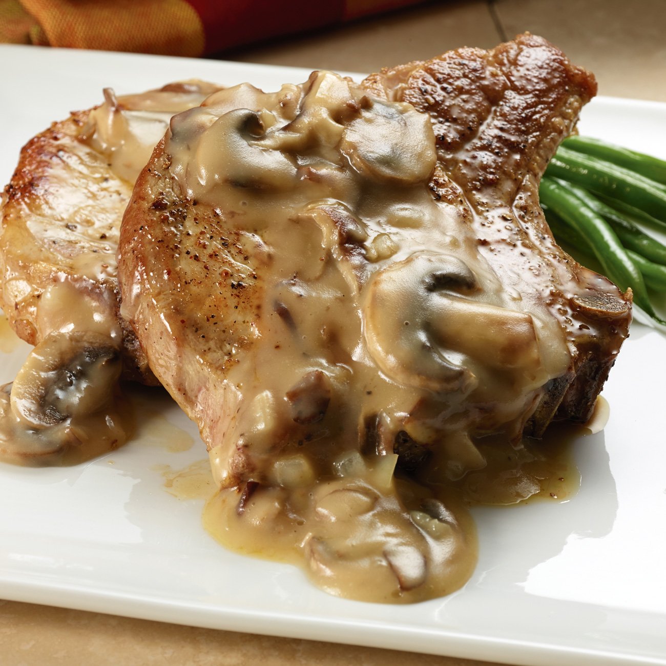 Pork Chops With Shiitake Wine Butter Sauce Recipe from HEB