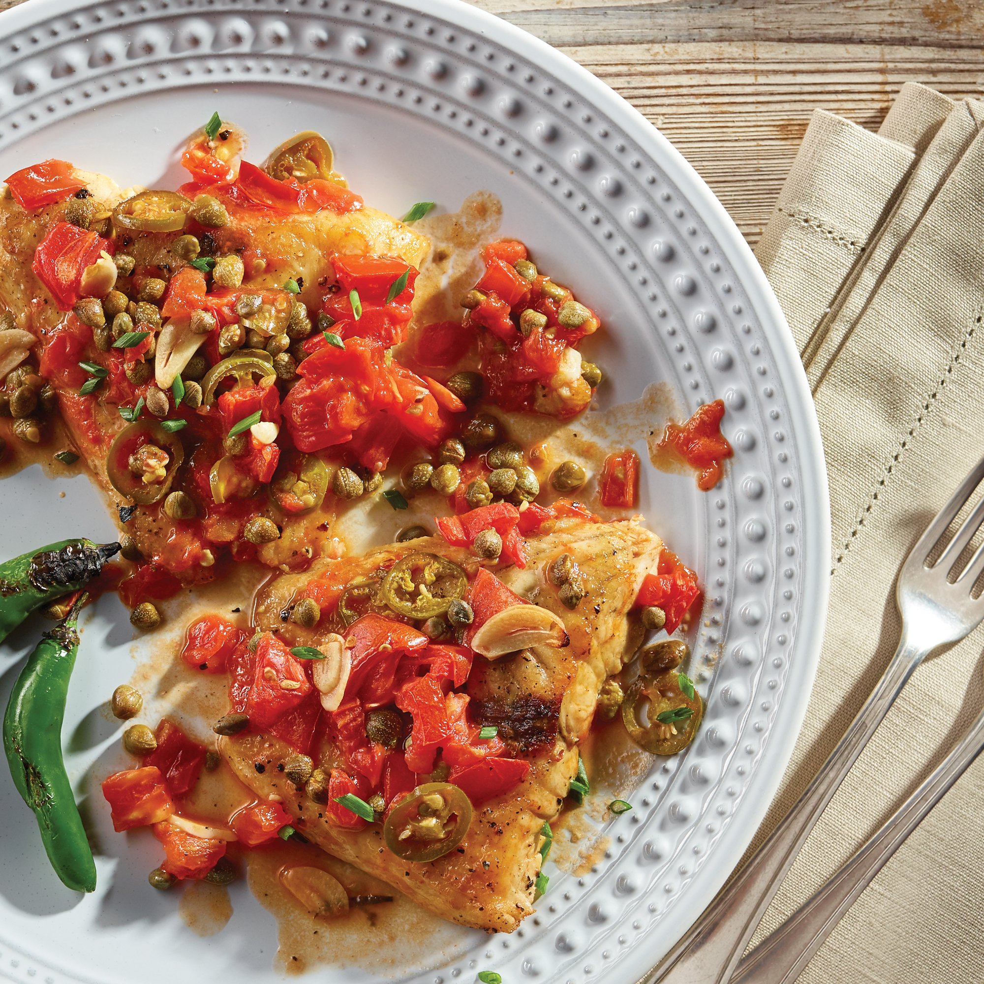 Roasted Sea Bass with Capers and Heirloom Tomato Recipe from HEB