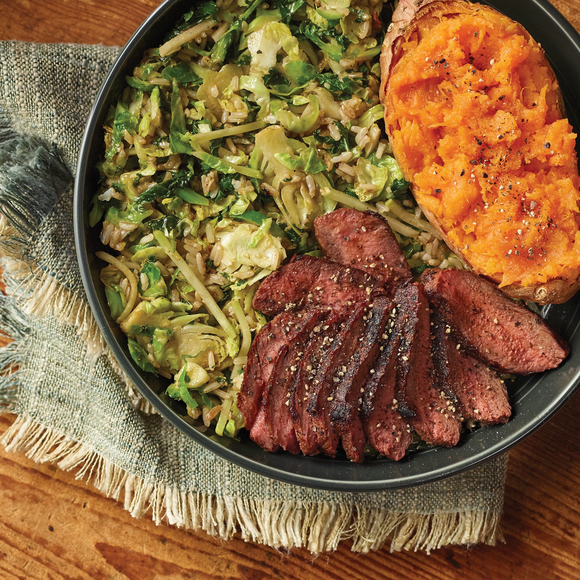 Smokehouse Brussels Nourish Bowl with Seared Flat Iron Steak Recipe