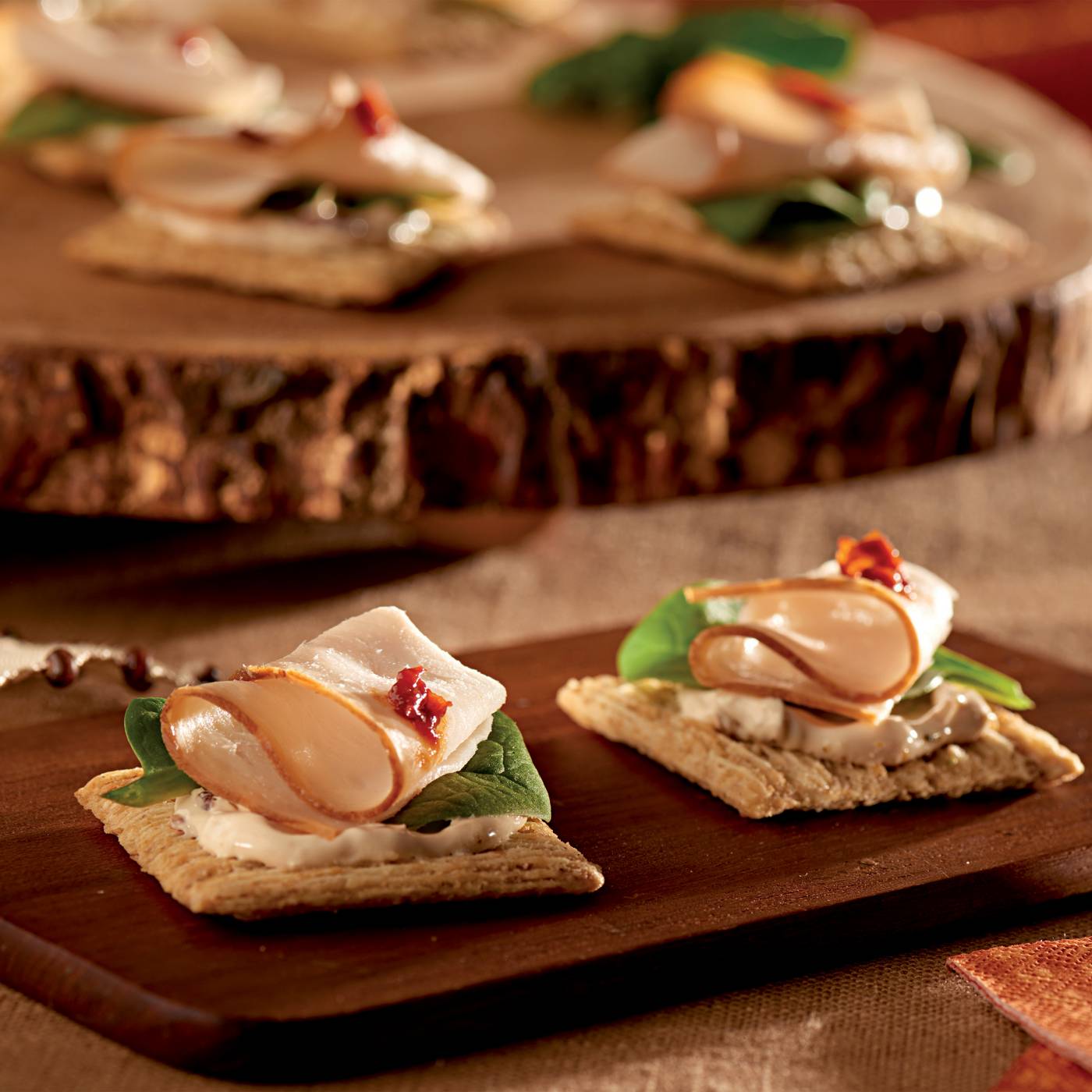 Triscuit Four Cheese and Herb Whole Grain Wheat Crackers; image 6 of 10