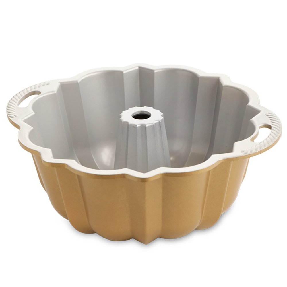 Washing dirty aluminum bundt cake pan Stock Photo by arina-habich