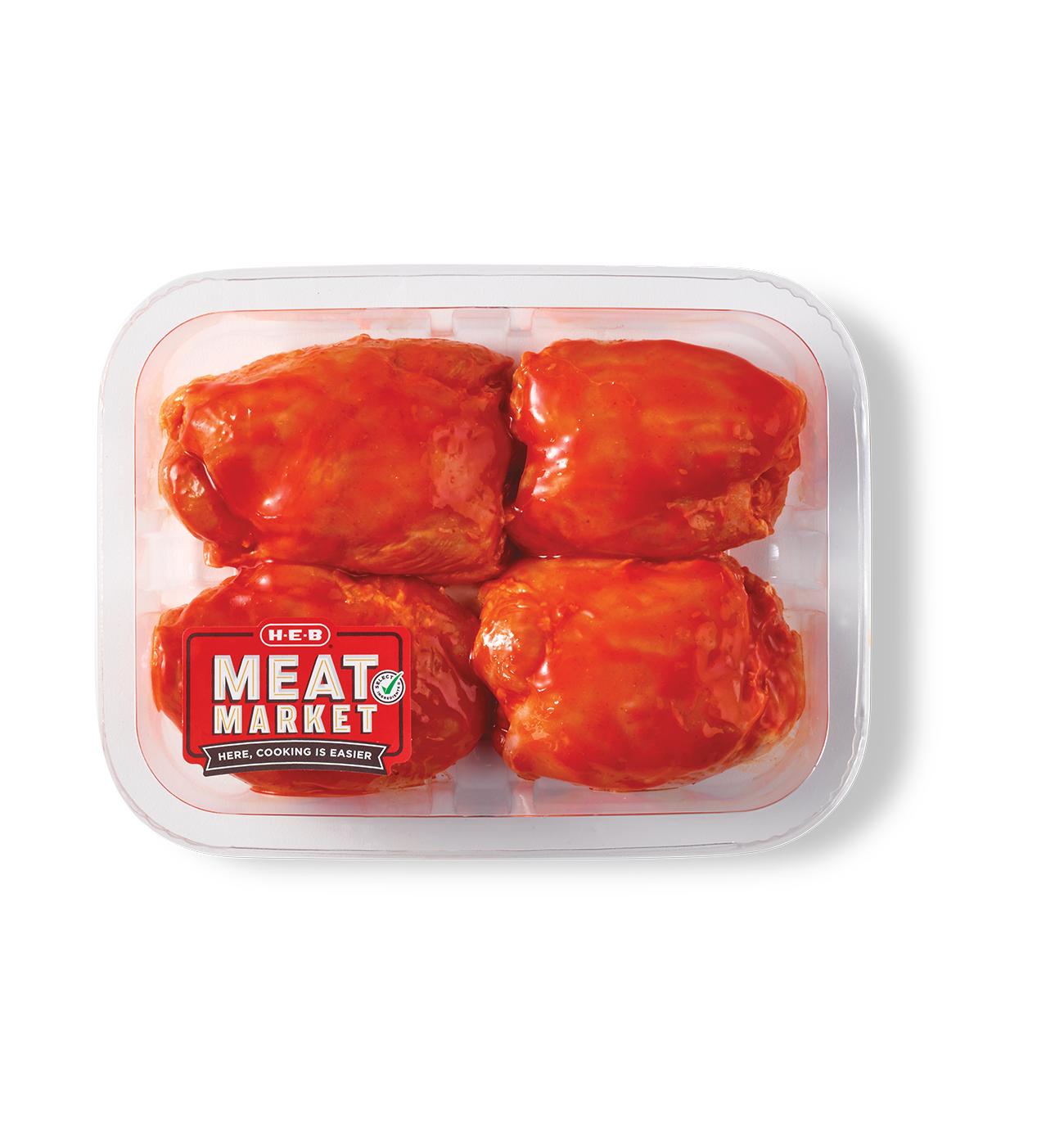 H-E-B Meat Market Marinated Boneless Chicken Thighs - Hot Wing Sauce; image 1 of 3