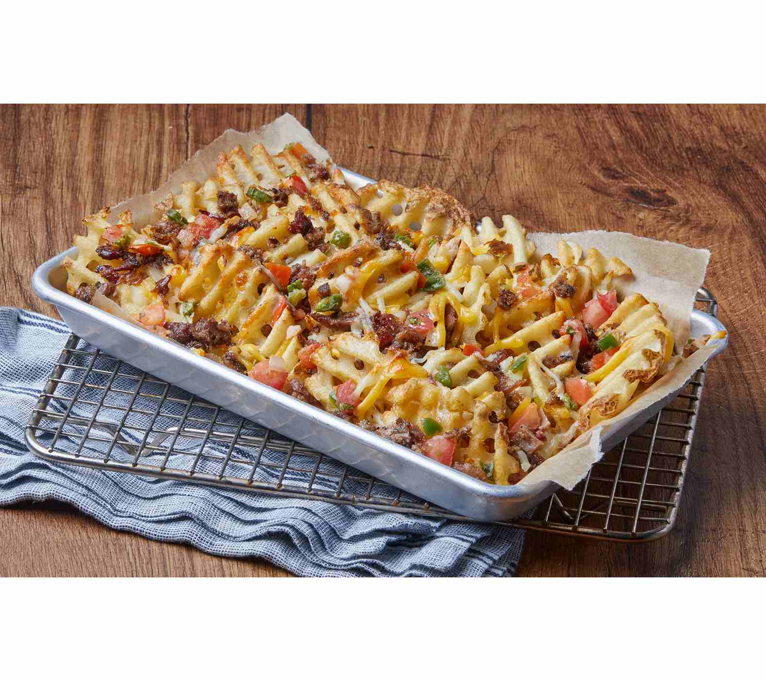 H-E-B Loaded Waffle Fries – Brisket Queso; image 2 of 2