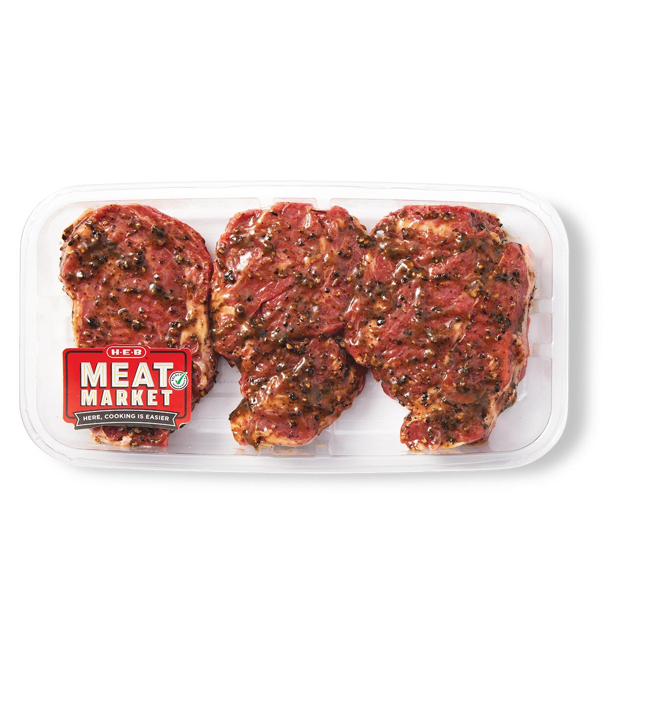 H-E-B Meat Market Marinated Boneless Beef Chuck Eye Steaks – Garlic Peppercorn; image 1 of 3