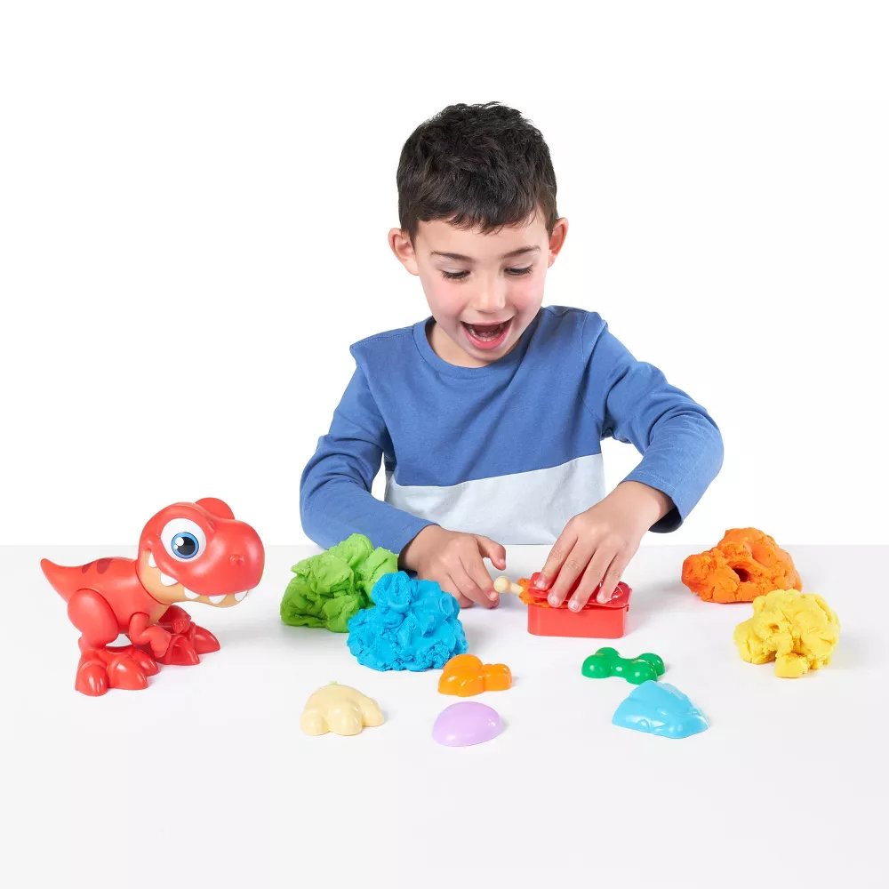 Smashers Junior Dino Dig Uovo Con Dinosauro Raptor – 500g Di Pasta, 3 Stampini E 18 Sorprese, Gioco Sensoriale Per Bambini 18 Mesi – 3 Anni, Da Scavare E Costruire