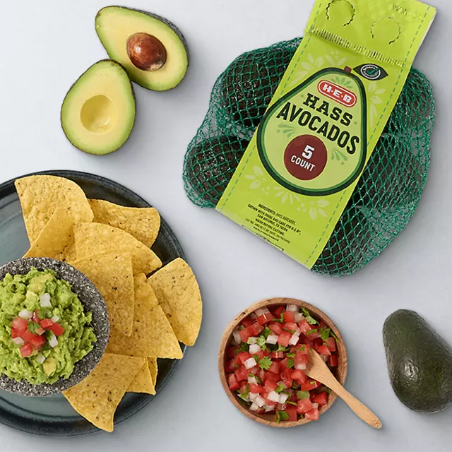 Chips & guac, with pico de gallo and avocados on the side