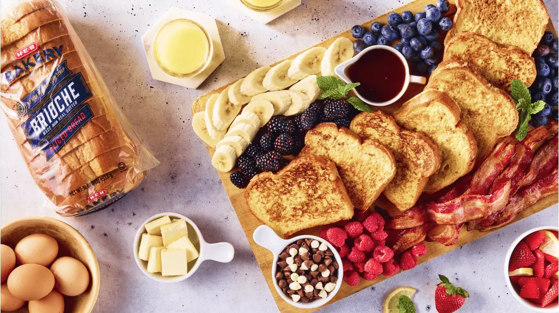 Toast, bacon, fruit, eggs, butter