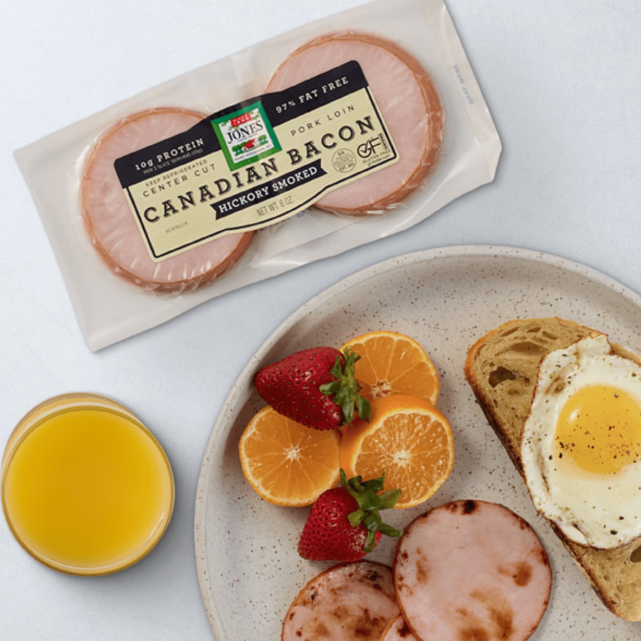 Canadian bacon, eggs, juice