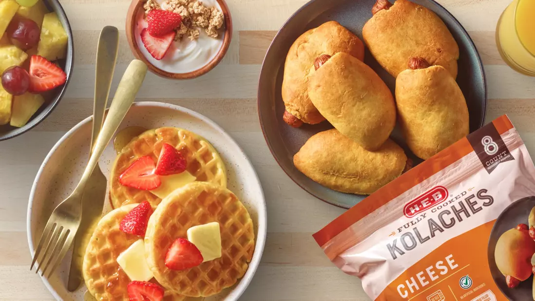 Waffles, kolaches, strawberries and pineapple sliced on waffles