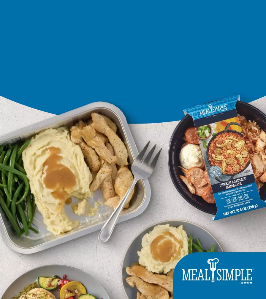 Banner promoting H‑E‑B Meal Simple prepared meals featuring ready-to-heat and oven-ready entrees with mashed potatoes, green beans, chicken, and seafood dishes. Text reads: “Dinners made Meal Simple. From ready-to-heat to oven-ready.”