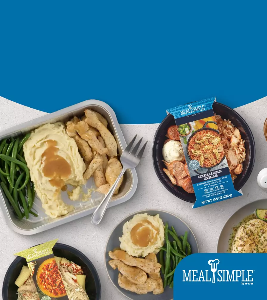 H‑E‑B Meal Simple meals scattered around together with 2 shakers besides them (salt & pepper)