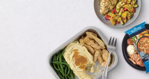 Banner featuring Meal Simple prepared meals, including sliced turkey with gravy and green beans, a packaged entrée, and a bowl of roasted vegetables. Text reads “Dinner’s done with Meal Simple.”