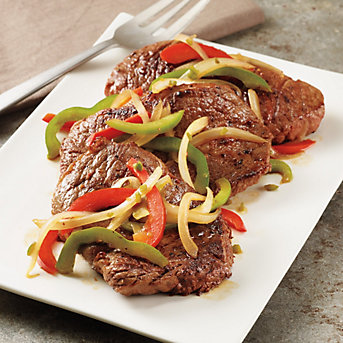 Sautéed Steaks With Onion And Bell Peppers
