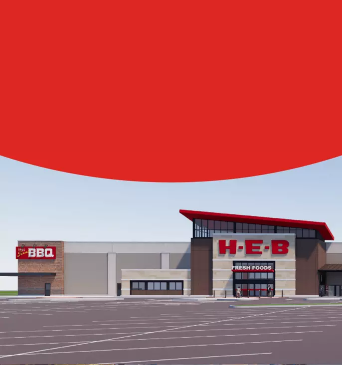 H‑E‑B Fresh Foods store exterior with True Texas BBQ, front entrance, and expansive parking lot.