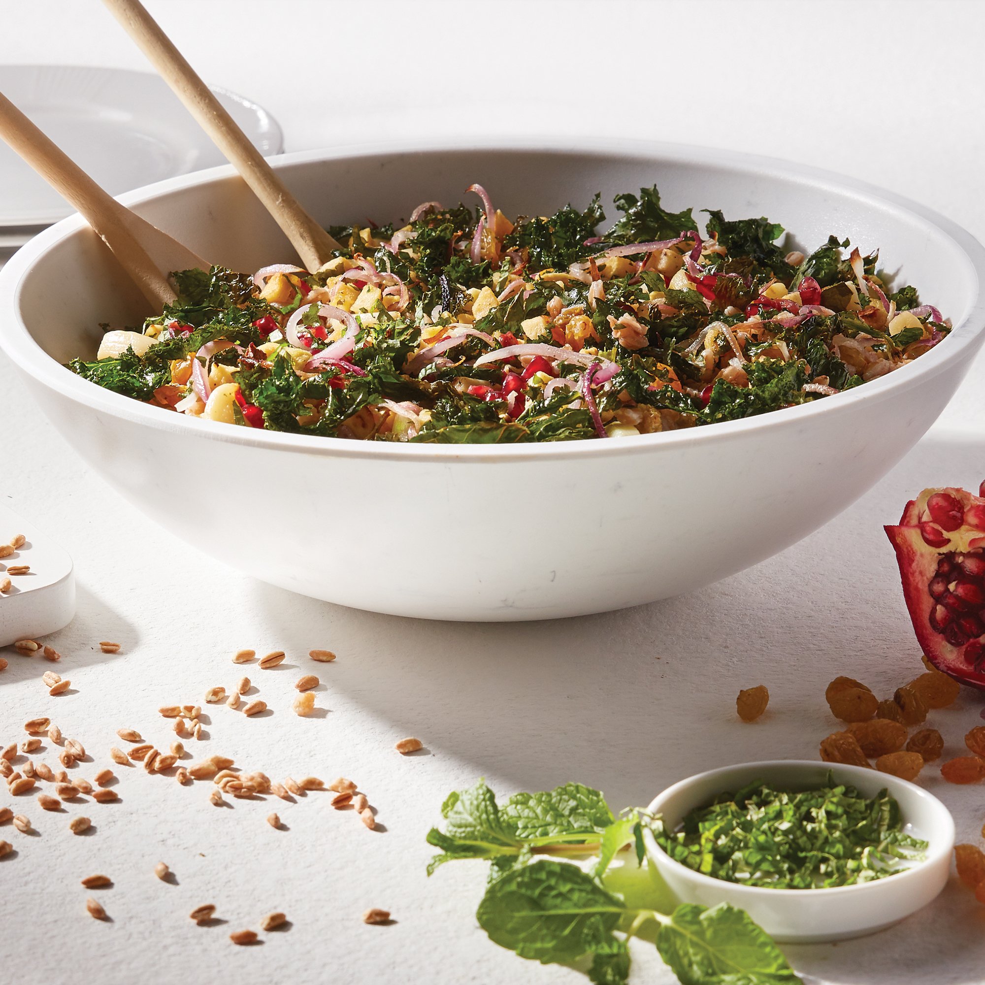 https://images.heb.com/is/image/HEBGrocery/Test/warm-winter-farro-salad-with-opal-and-pomegranate-recipe.jpg