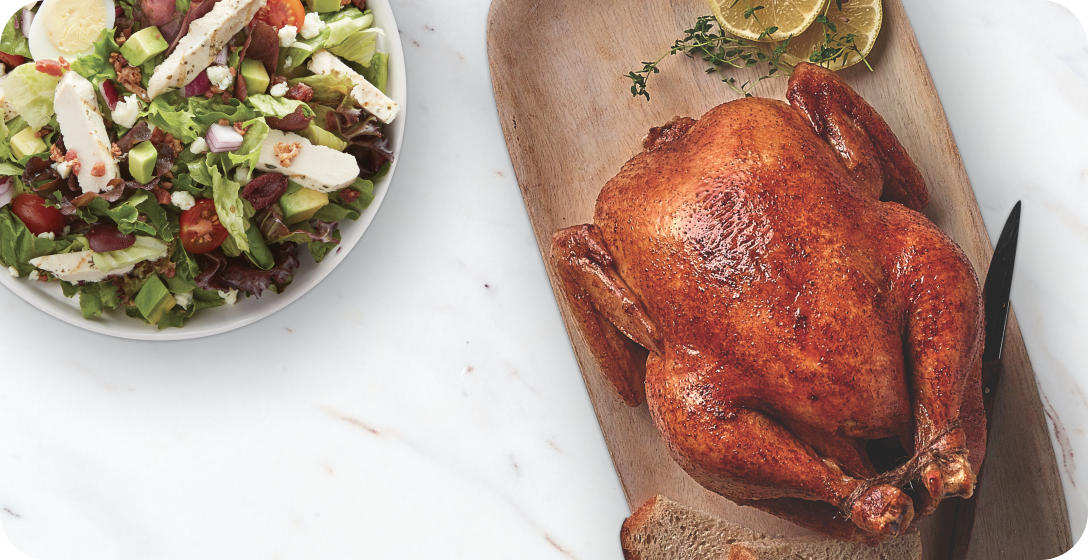 Baked turkey next to salad 