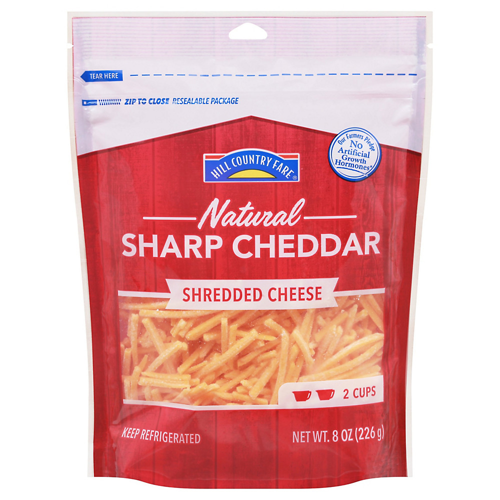 Calories in Hill Country Fare Sharp Cheddar, Shredded, 8 oz