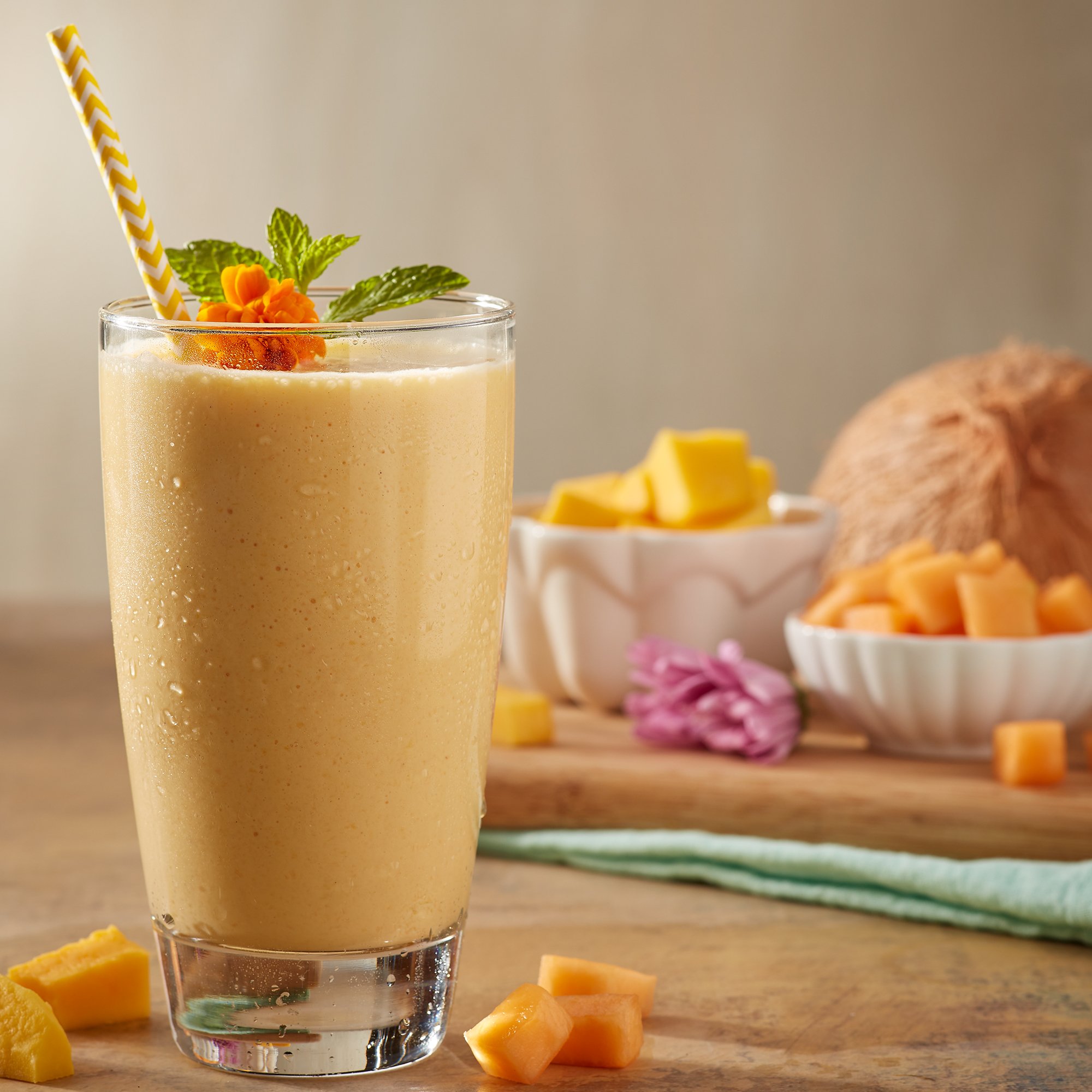 https://images.heb.com/is/image/HEBGrocery/recipe-hm-large/mango-and-summer-gem-melon-lassi-recipe.jpg