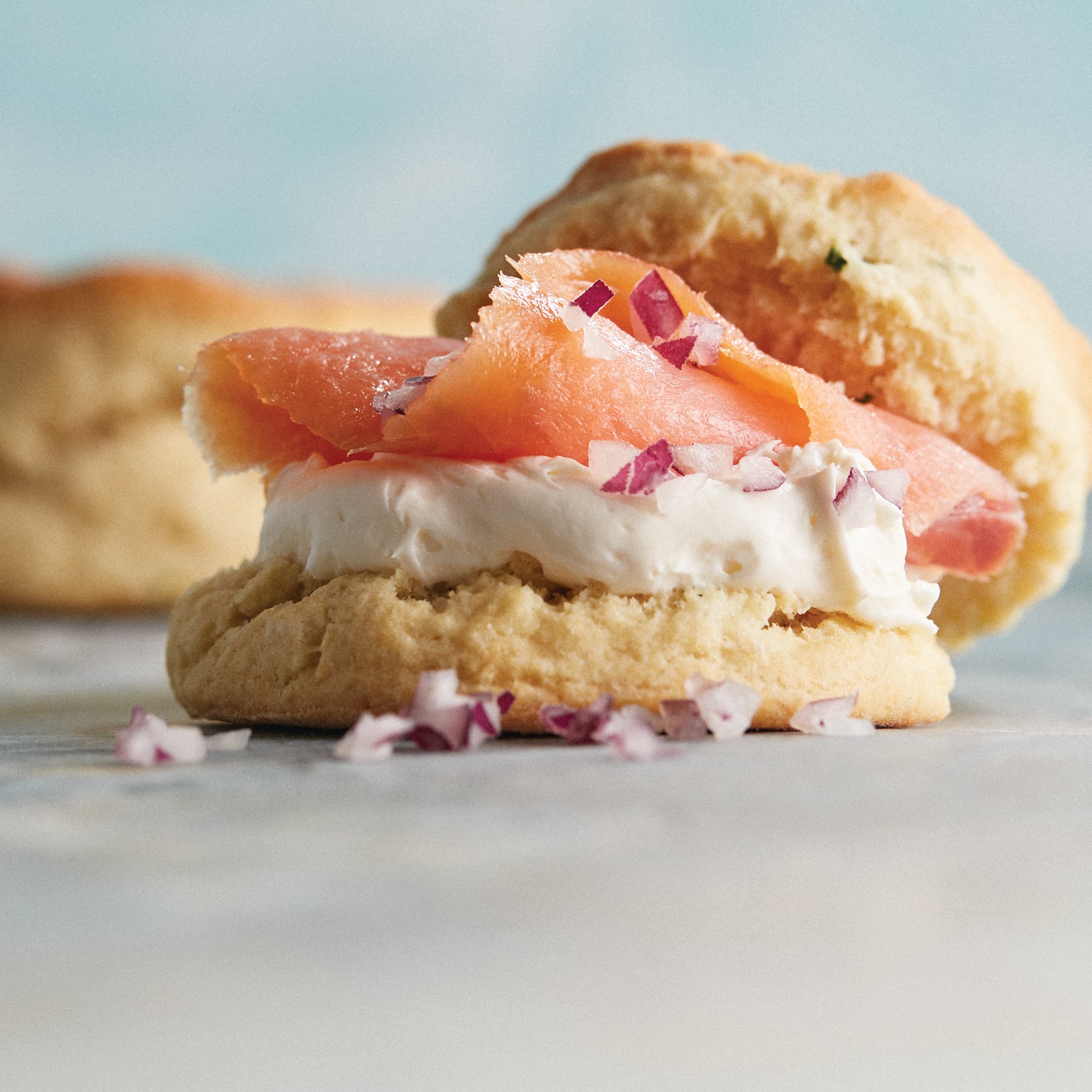 https://images.heb.com/is/image/HEBGrocery/recipe-hm-large/smoked-salmon-with-cream-cheese-chive-biscuits-recipe.jpg